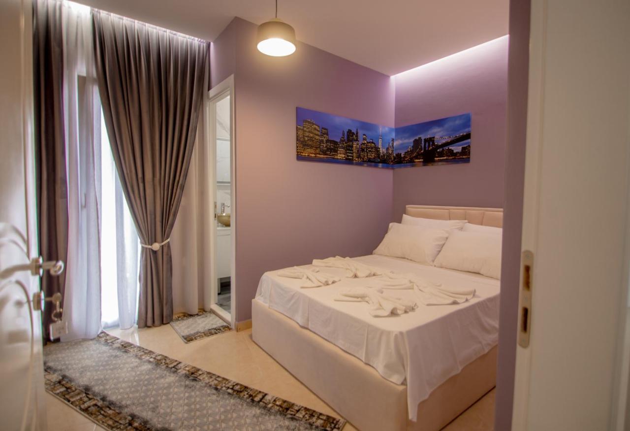 Ajilin Hotel Rooms Корча Экстерьер фото