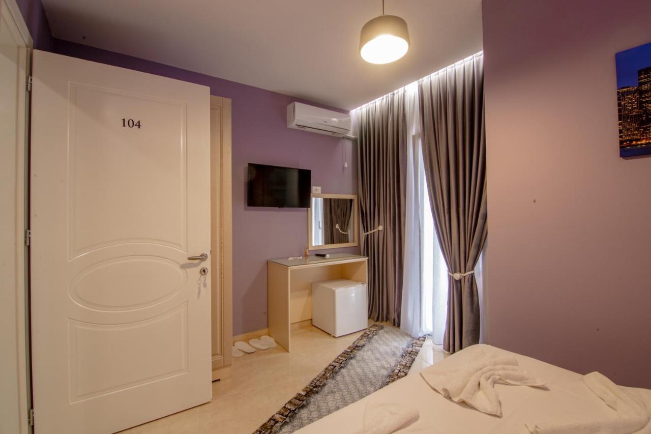 Ajilin Hotel Rooms Корча Экстерьер фото