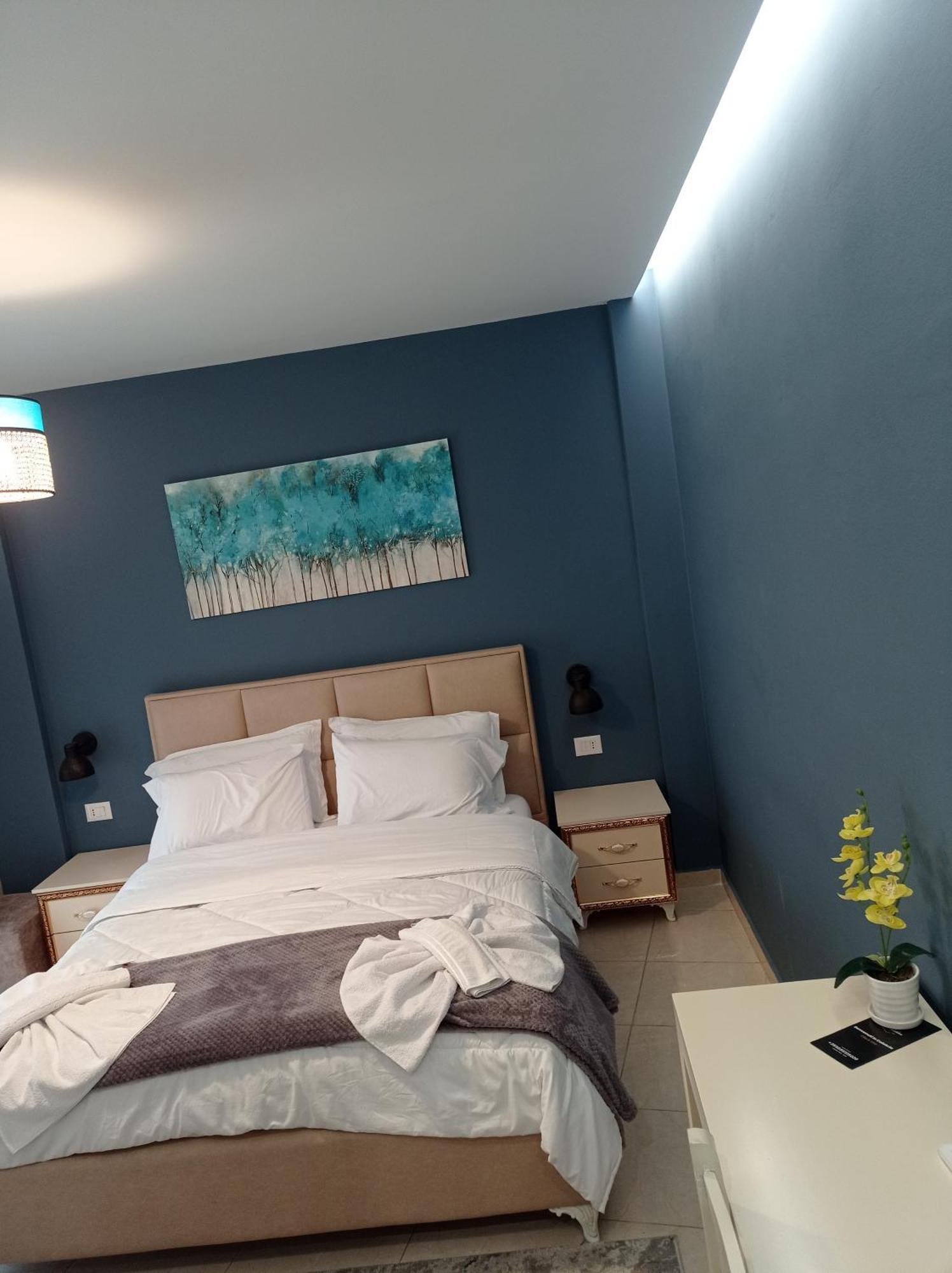 Ajilin Hotel Rooms Корча Экстерьер фото
