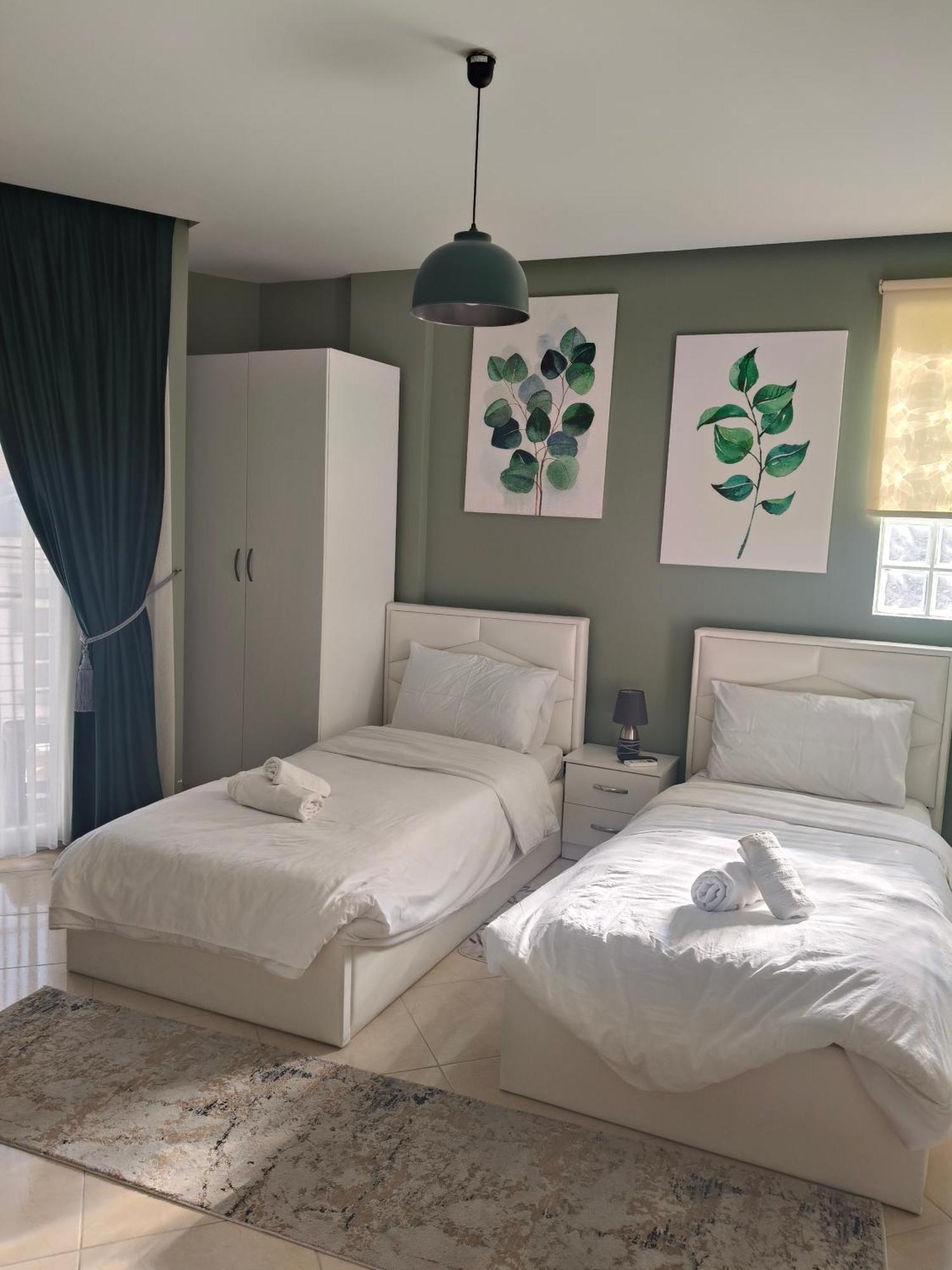 Ajilin Hotel Rooms Корча Номер фото